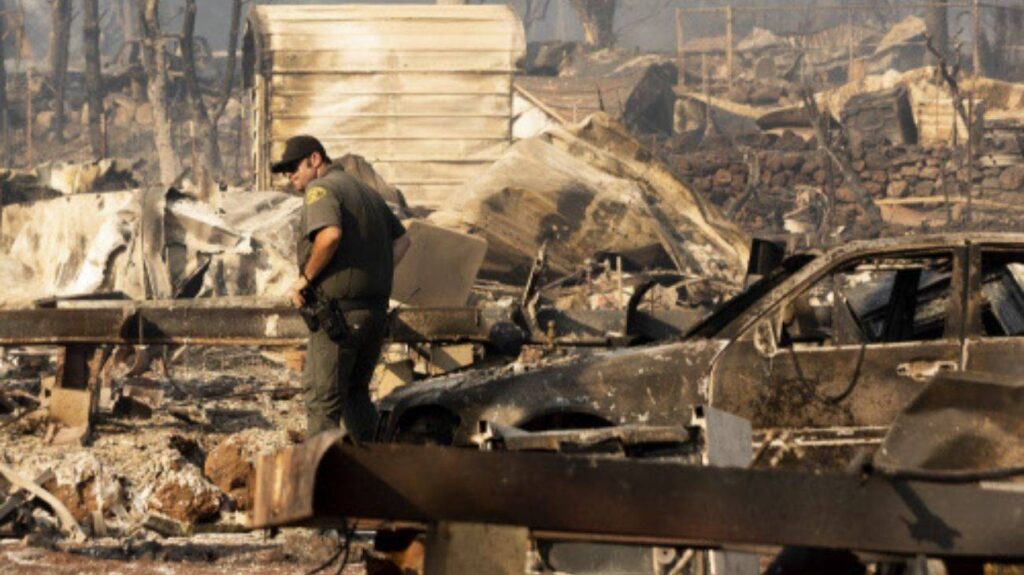 Dozens of homes burn as California wildfire siege continues