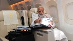 On a long flight to the US, PM Modi spends time clearing files, doing paper-work