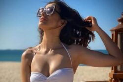 South Star Raai Laxmi Sizzles in White Bikini in Beach Pics