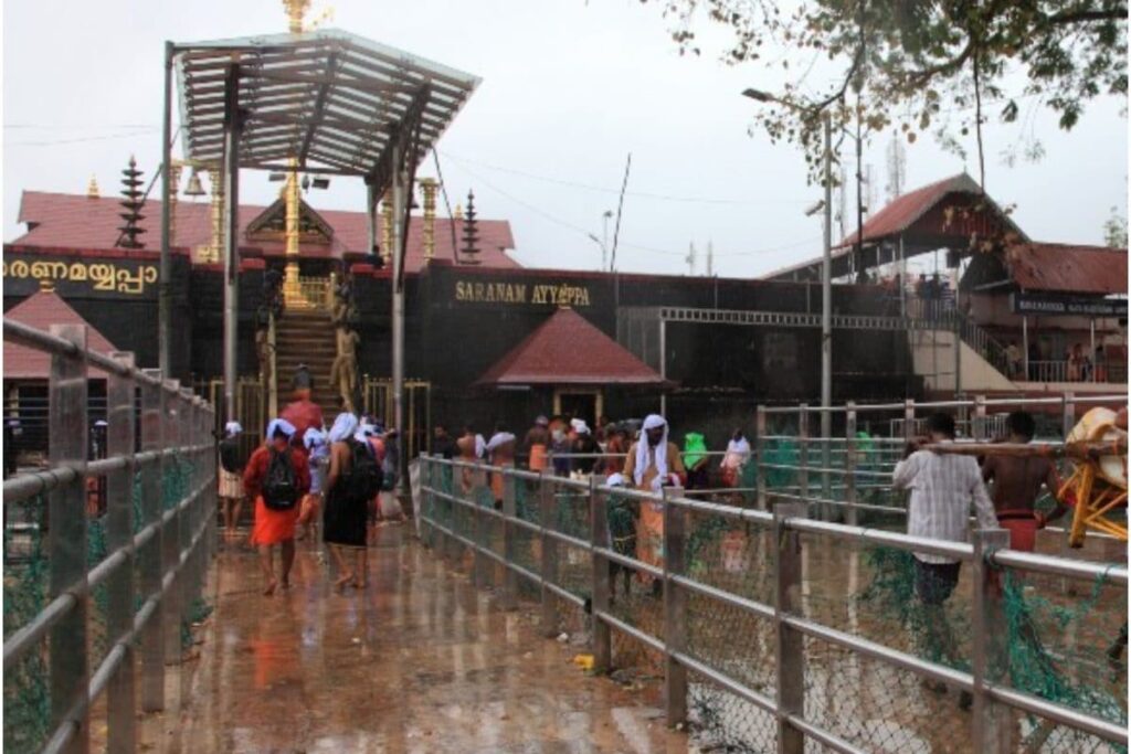 Sabarimala Devotees Brave Heavy Rains to Offer Prayers