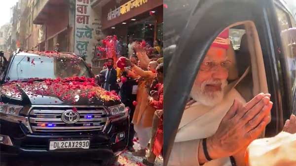 Watch: PM breaks security protocol, stops car on Varanasi street, to accept gifts from Local