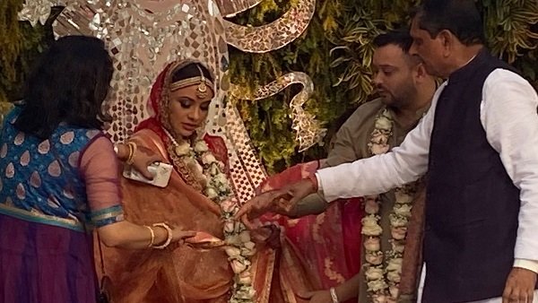 Lalu Prasad's son Tejashwi marries childhood friend; check out marriage photos