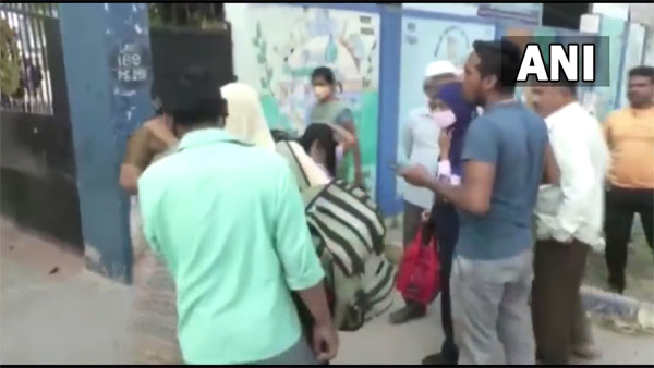 Watch: Argument between parents, teacher outside Rotary School in Mandya over hijab in classroom