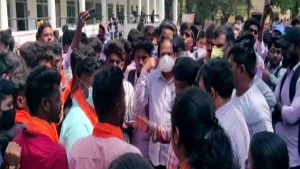 Students wear saffron shawls amid row over Hijab in Karnataka