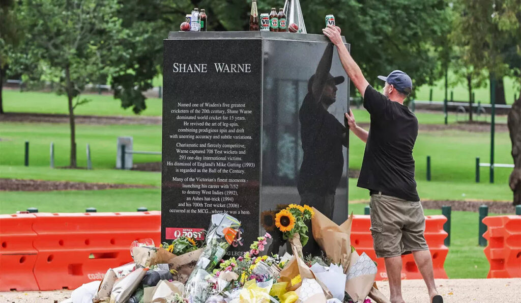 Flowers, beers, ciggies and a meat pie: Australian fans mark Warne's death