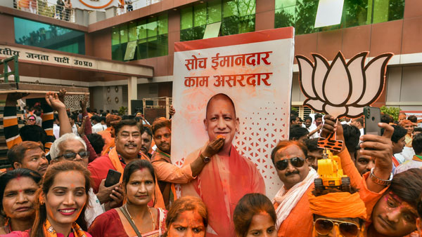 Celebrations begin in UP as BJP gets set to register historic win