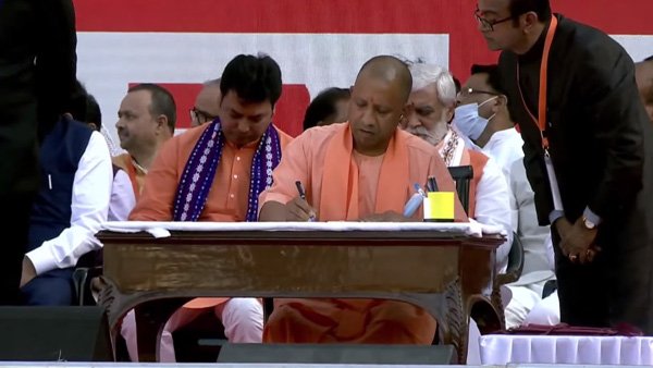 Big-wigs bless Yogi as he takes charge of UP in historic second term