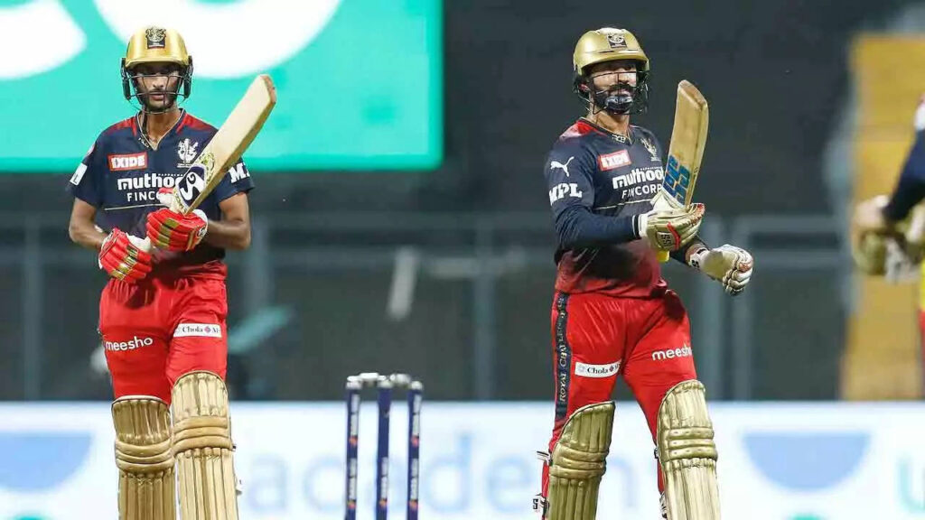 In Pics: Dinesh Karthik stars as RCB enter top four