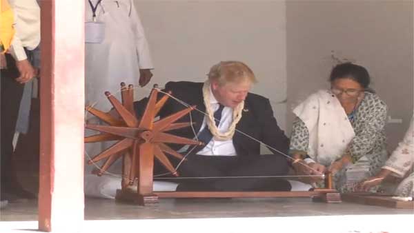 Watch: UK PM Boris Johnson visits Sabarmati Ashram, tries his hands on 'charkha'