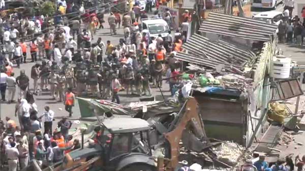 How bull dozers are razing encroachments in Delhi? See it in pics and videos