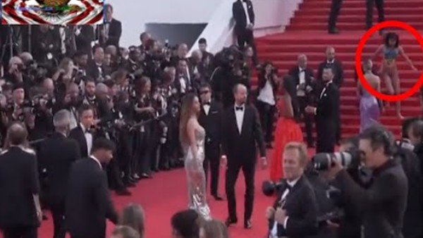 'Stop raping us': Topless woman storms Cannes red carpet to protest against sexual violence in Ukraine