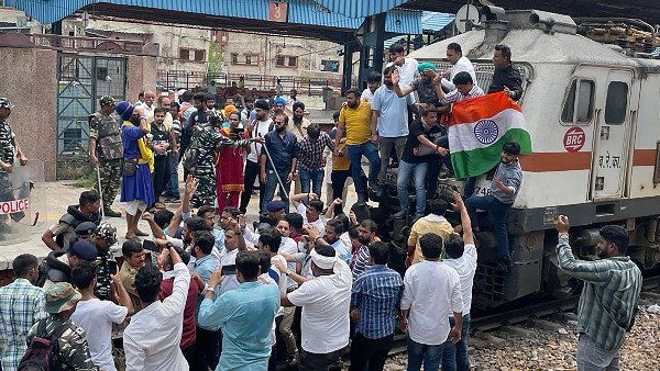 Watch: Youth Congress workers stop train at Delhi's Shivaji Bridge station