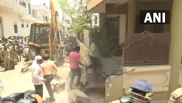 Prophet remark row: PDA demolishes "illegally constructed" residence of violence accused