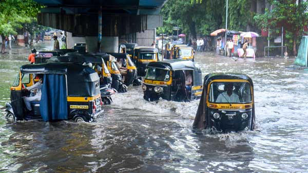 Heavy rain lashes Mumbai: Orange alert issued, bus, train services hit