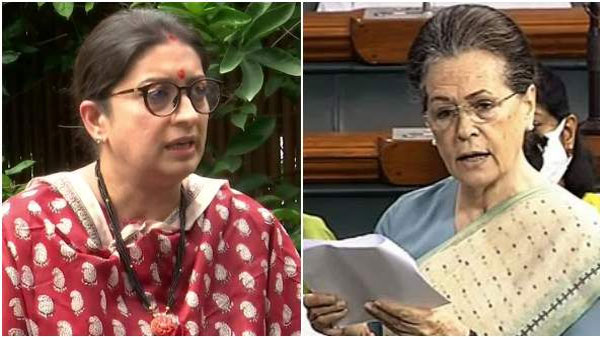 Sonia Gandhi-Smriti Irani face-off: Cong MPs protest in Parl premises, demand govt apology