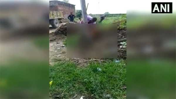 Video of man beating his wife after tying her to electric pole goes viral