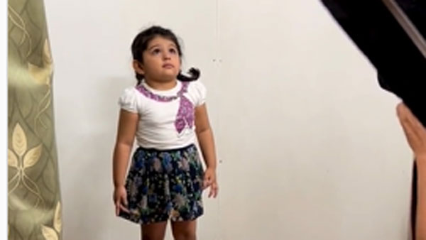 This viral video of a kid getting her visa photo clicked will make you go aww