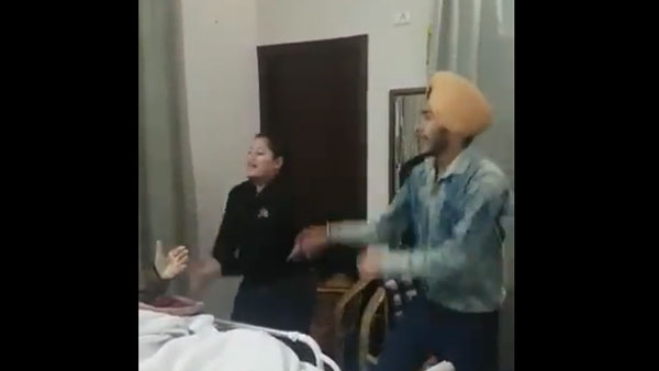 An old, bedbound man is all smiles as his family performs bhangra to cheer him up | Viral Video