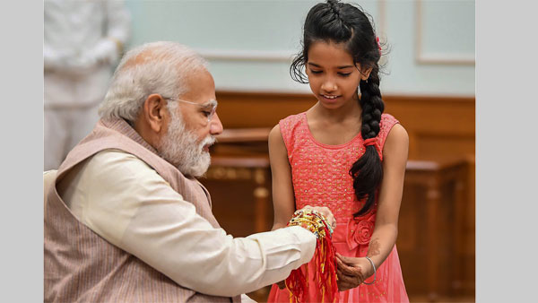 Memory of a lifetime: PMO staff's daughters celebrate Raksha Bandhan with PM Modi