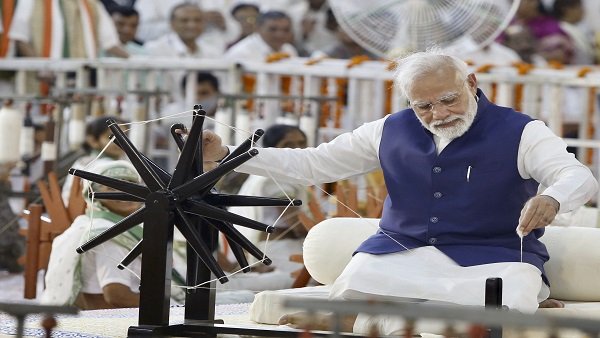 Watch: PM Modi spinning charkha at Khadi Utsav in Gujarat