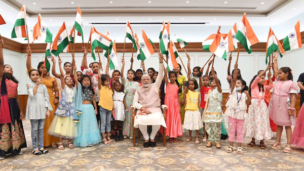 In Pics: PM Modi gives Tiranga to every child to mark Har Ghar Tiranga campaign