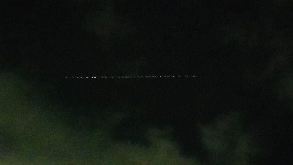 Caught on Camera: Strange ‘moving train’ of lights spotted in the night sky in UP, leave netizens puzzled