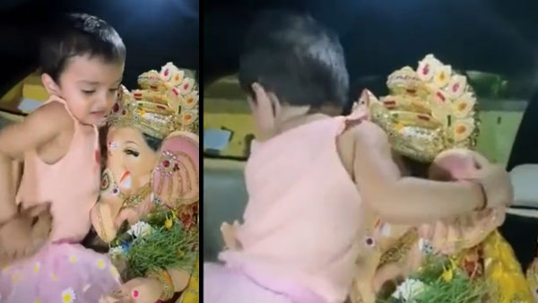 Video: Girl cries emotionally & refuses to part with Lord Ganesha during Visarjan