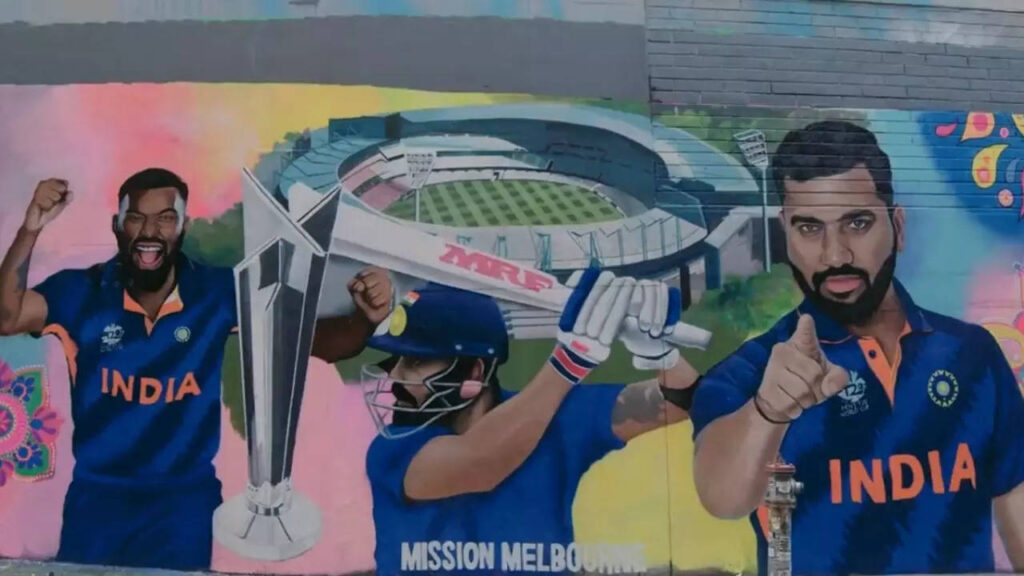 Watch: Fans in Melbourne paint street mural to welcome Men in Blue