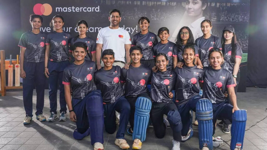 Dhoni mentors U-19 women players at a cricket clinic in Mumbai