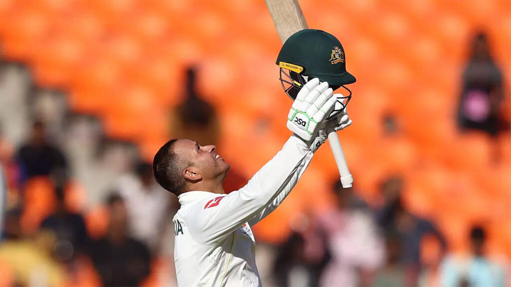 After carrying drinks, Khawaja delighted to tick off the milestone