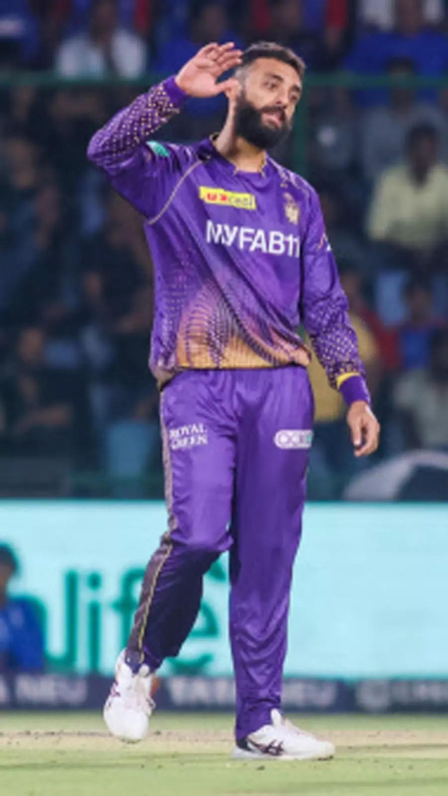 Pics: Varun completes 50 IPL wickets for KKR