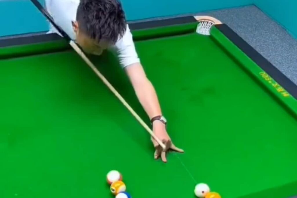 Man Defies Physics With His Unbelievable Billiards Shots