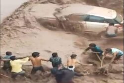 An Overflowing River, a Rope & Several Locals: How a Woman Was Rescued as Her Car Got Stuck | Video
