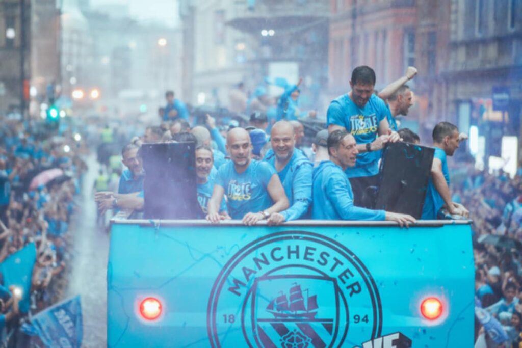Manchester Weather Fails, but Cityzens Rejoice in Rainy Treble Parade | WATCH
