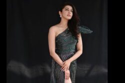 Pranitha Subhash Radiates Beauty In A Dark Green One-Shoulder Gown