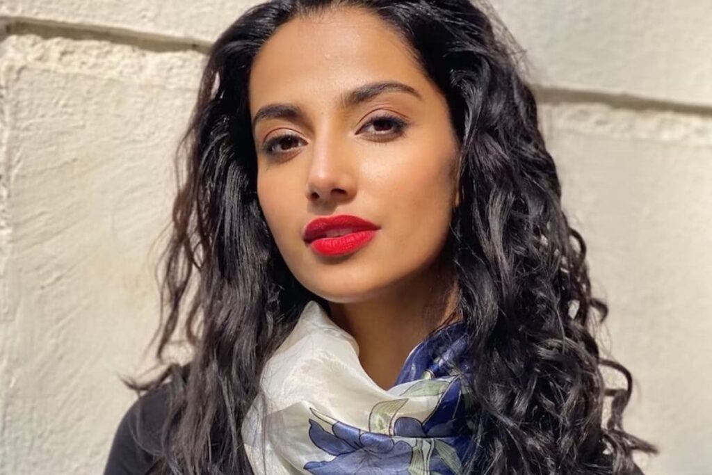 Meenakshi Chaudhary Looks Gorgeous In Black Top And Floral Printed Skirt