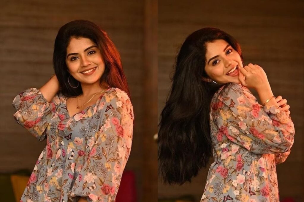 Actress Megha Shetty Looks Cute In A Multicoloured Floral Printed Top And Black Trousers