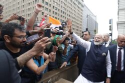 PM Modi in US: Indian Diaspora Brave Rain to Welcome Prime Minister in Washington | WATCH