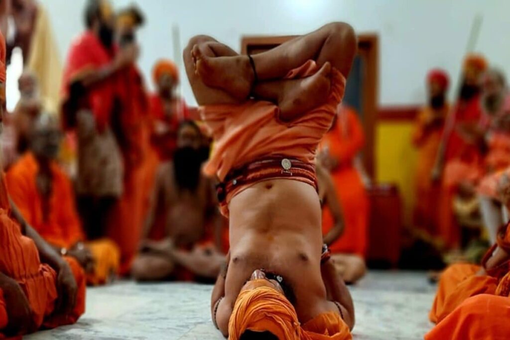 International Yoga Day Amidst Torrential Rains: Naga Sadhus Persist at Assam's Kamakhya Temple