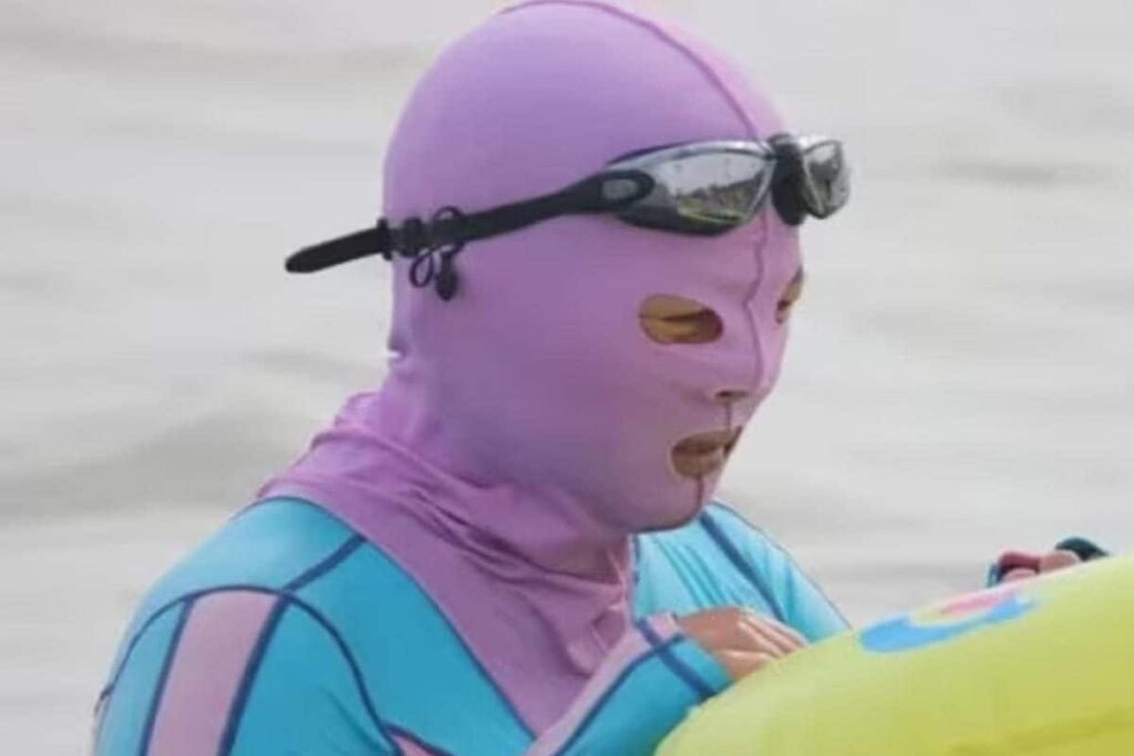 Chinese Are Beating The Heat With Bizarre 'Facekini' Trend— What Is It?