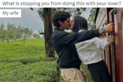 'What's Stopping You?': Viral Pic of Couple Kissing While Hanging on Train Gets Hilarious Replies