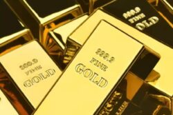 Gold Prices Slide as Fed Minutes Signal Expectations of Higher Rates