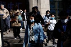 Economic Downturn Worries China, Beijing Relaxes Visa, Urban Residency Norms