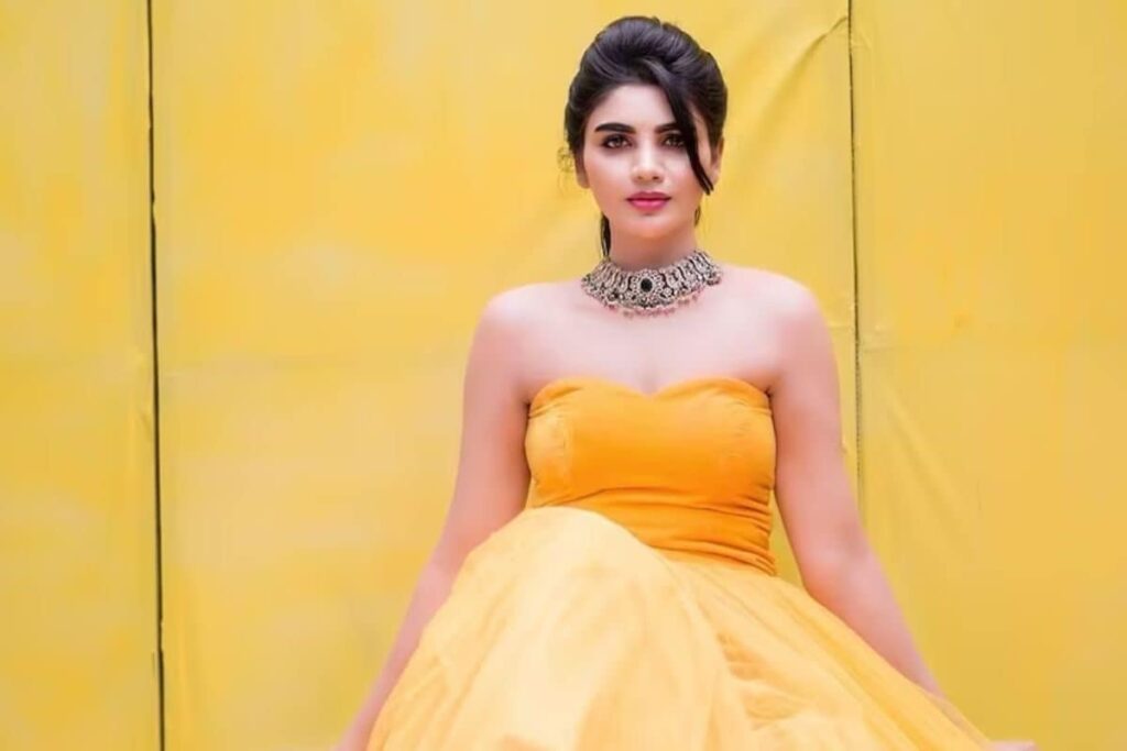 Actress Varsha Steals The Show In Her Vibrant Yellow Tulle Gown