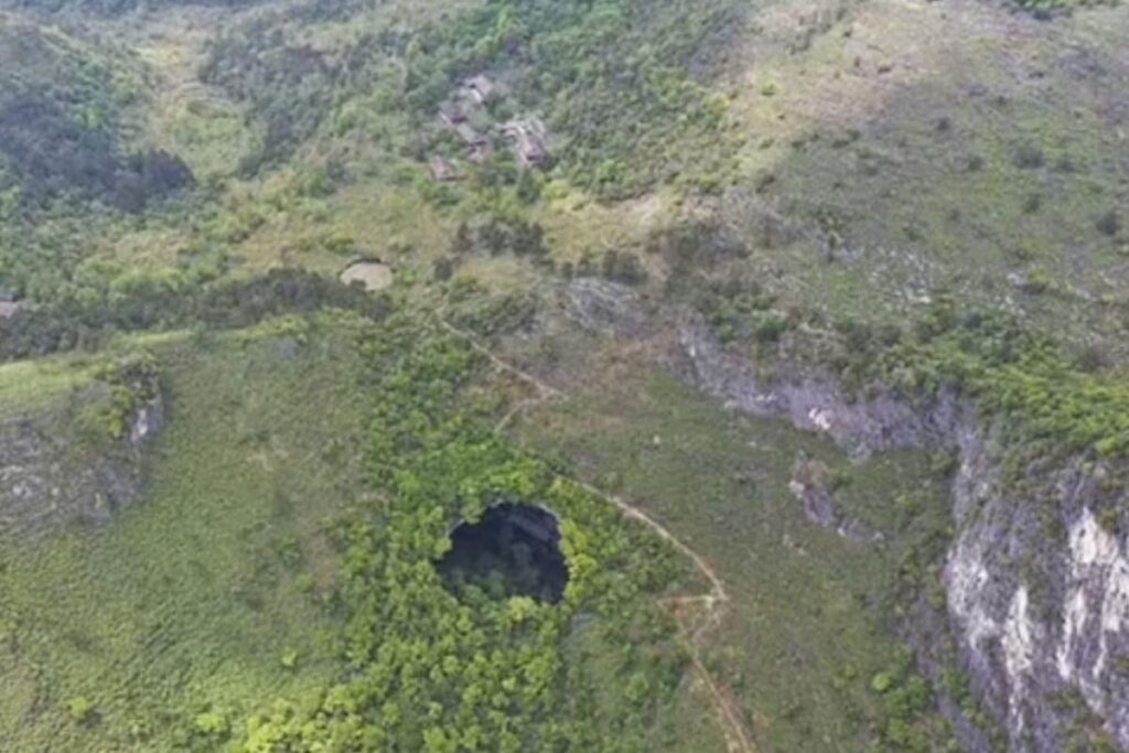 650-foot-deep Sinkhole With A Forest Inside It Discovered In China