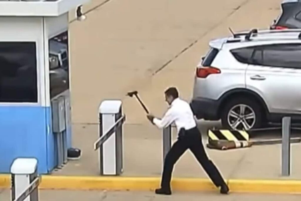 Watch: United Airlines Pilot Destroys Airport Parking Gate With Axe