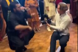 Wedding Photographer Syncs Dance Moves With Guests In This Must-Watch Video
