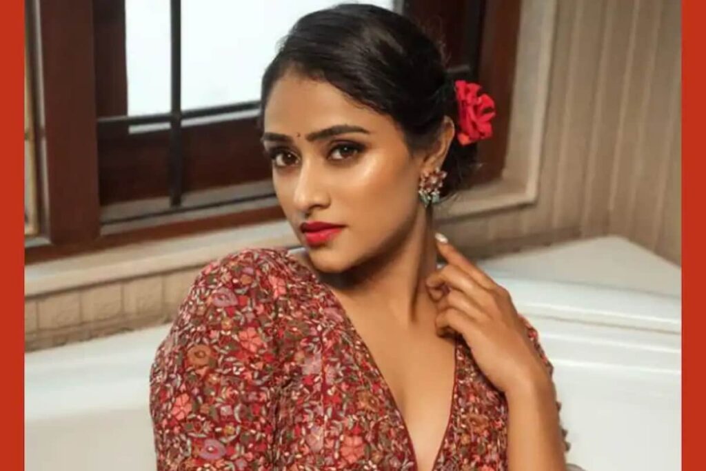 Actress Sangeetha Sringeri Drapes Silver And Red Saree For Bathtub Photoshoot