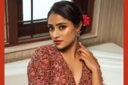 Actress Sangeetha Sringeri Drapes Silver And Red Saree For Bathtub Photoshoot