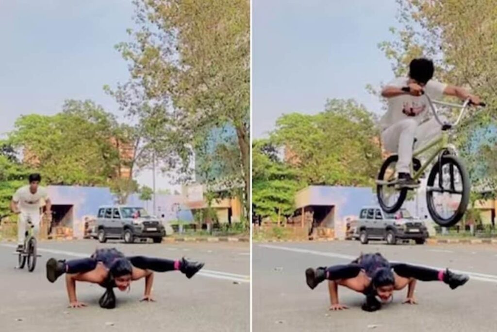 Watch: Girl Performs A Handstand, Boy Flies Past Right Above Her On Bicycle